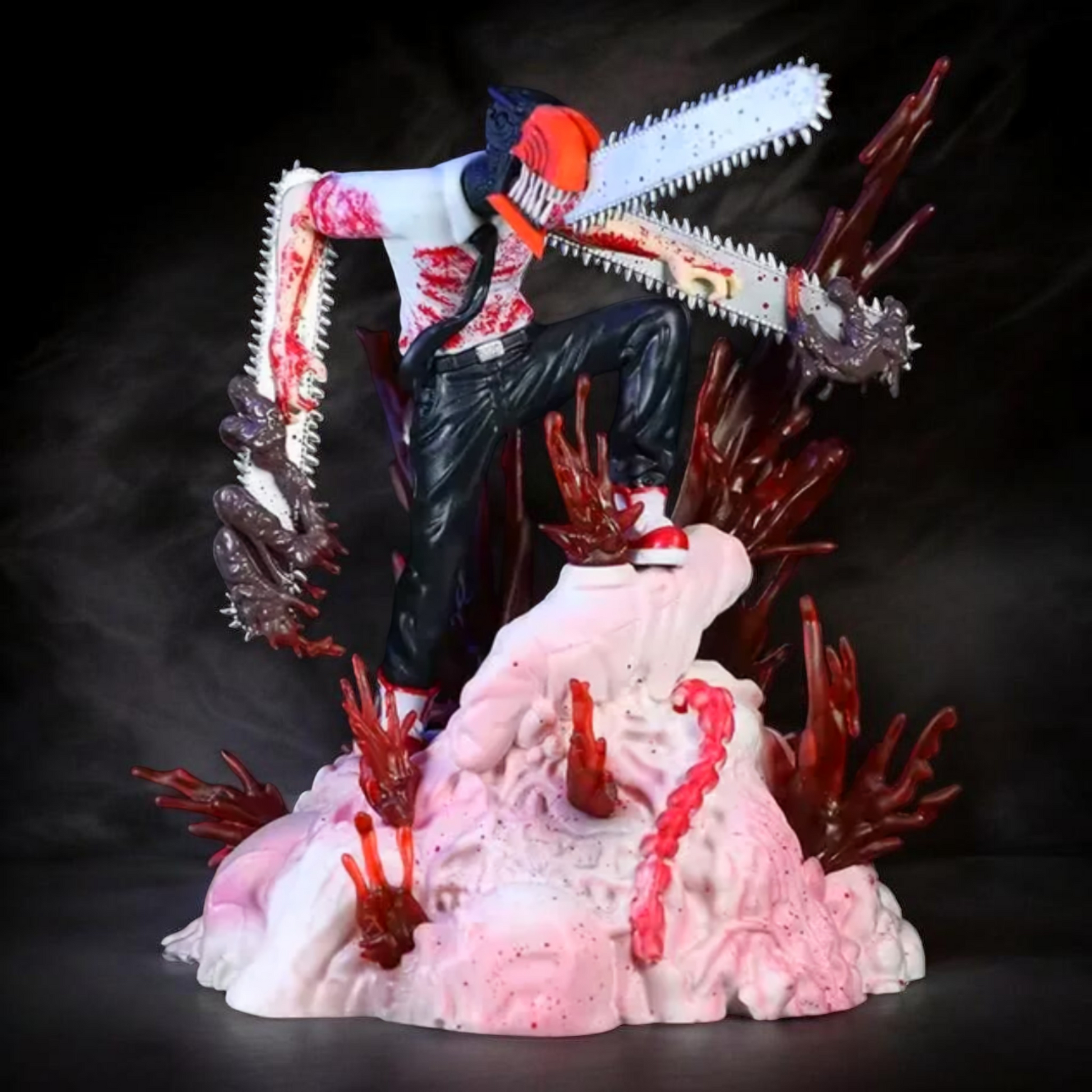 Gore-themed figurine with chainsaw on a dark background