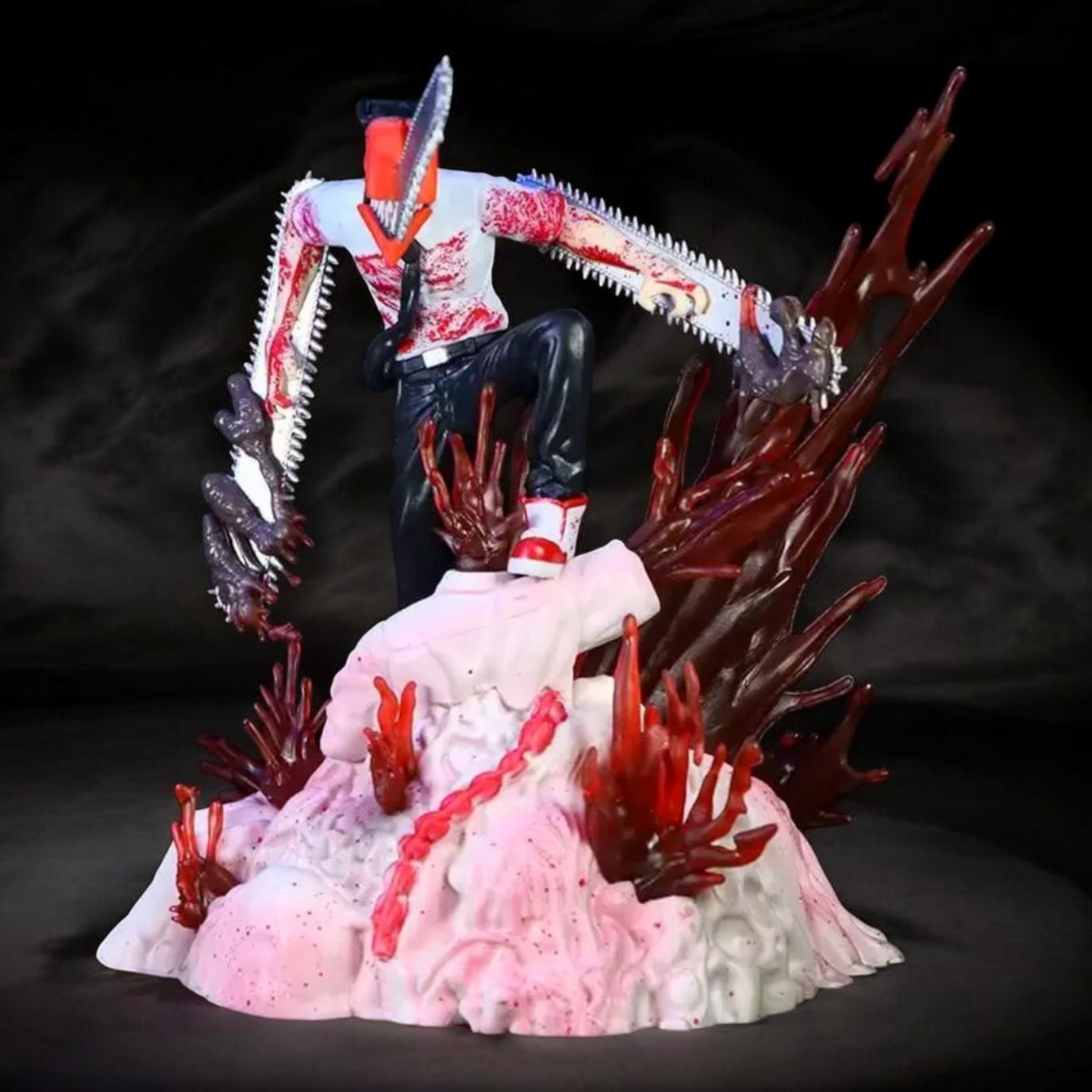 Gore-themed figurine with a detailed design on a dark background
