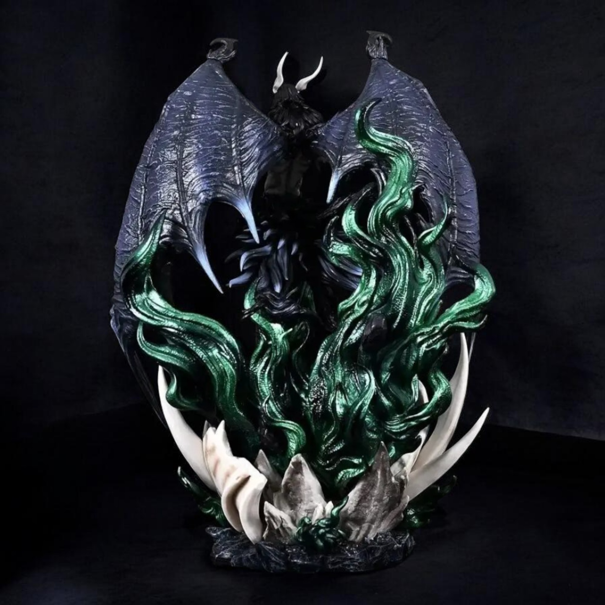 Decorative mask with green flames and antlers on a dark background