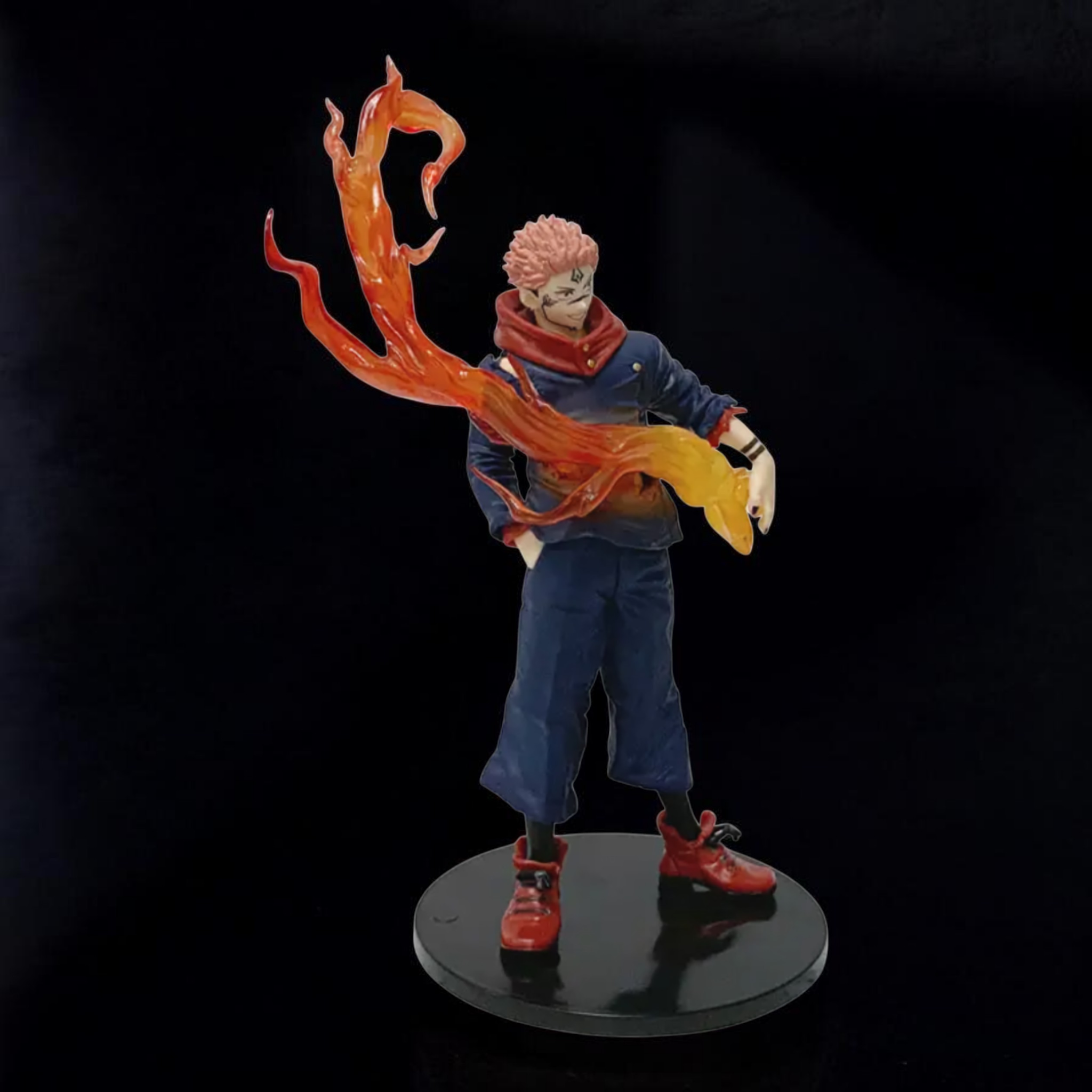 Action figure with fiery abilities on a black background