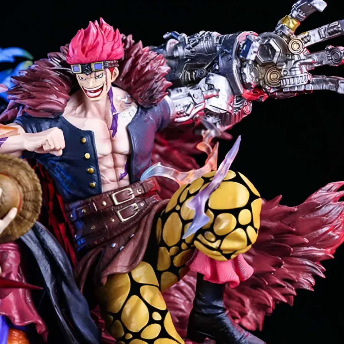 Action figure with red hair and mechanical arm against a dark background