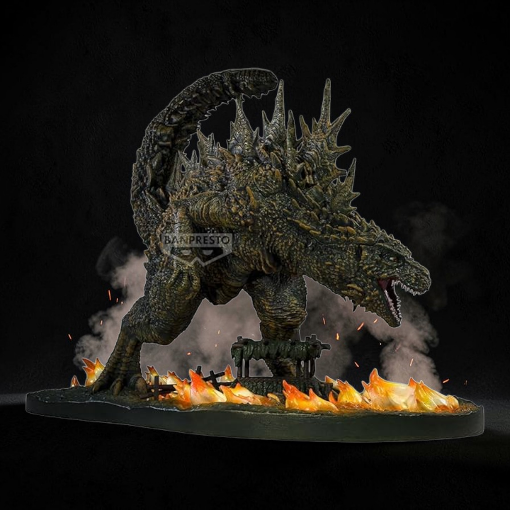 Monster figurine with flames and smoke on a dark background