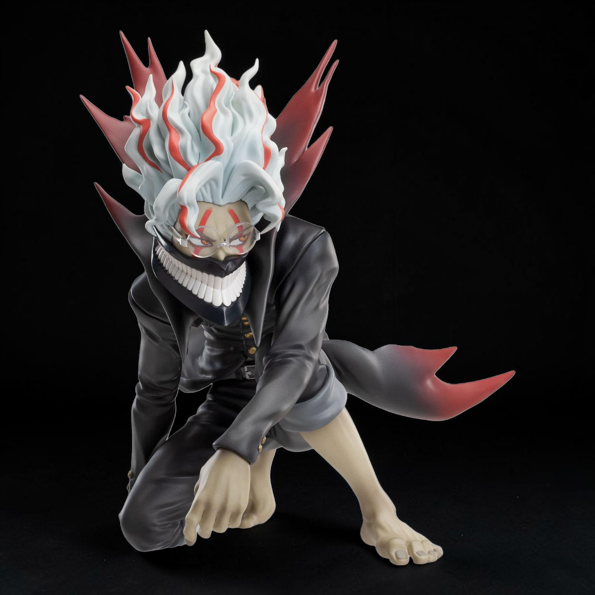 Anime character figurine with distinctive headpiece and tail on a black background