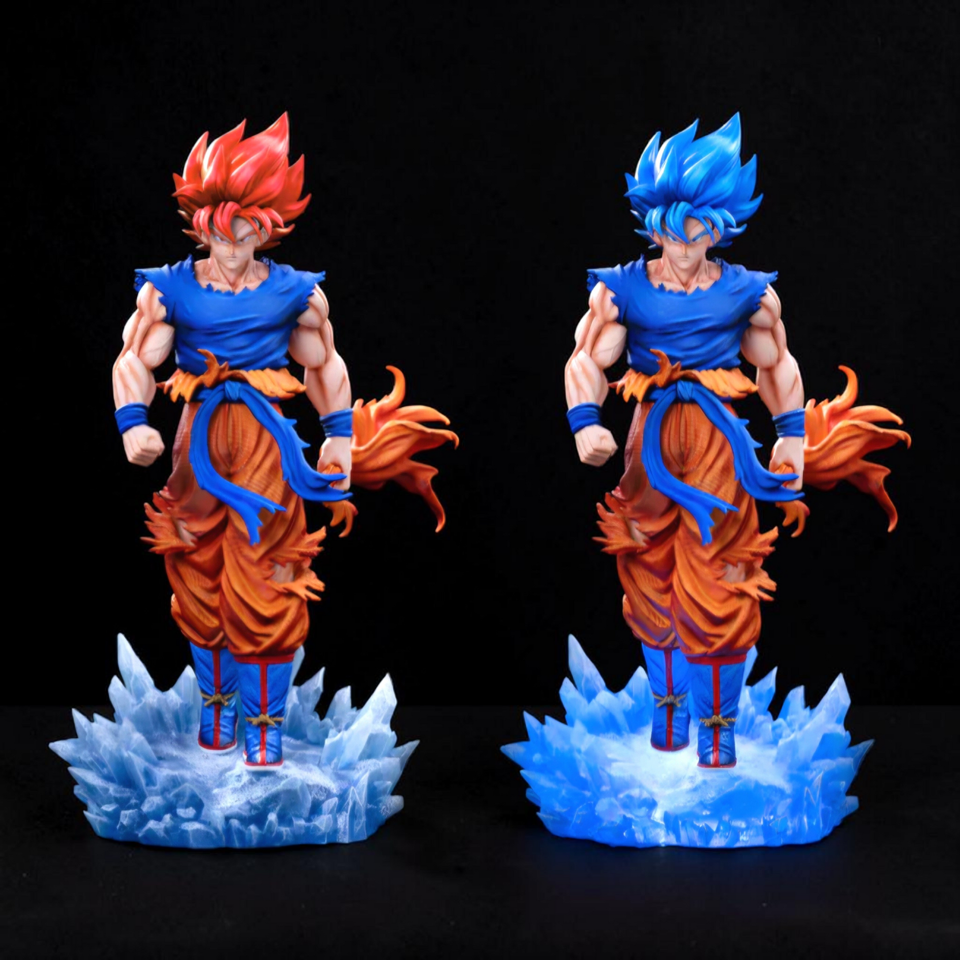 Two action figures with blue and orange hair on a black background