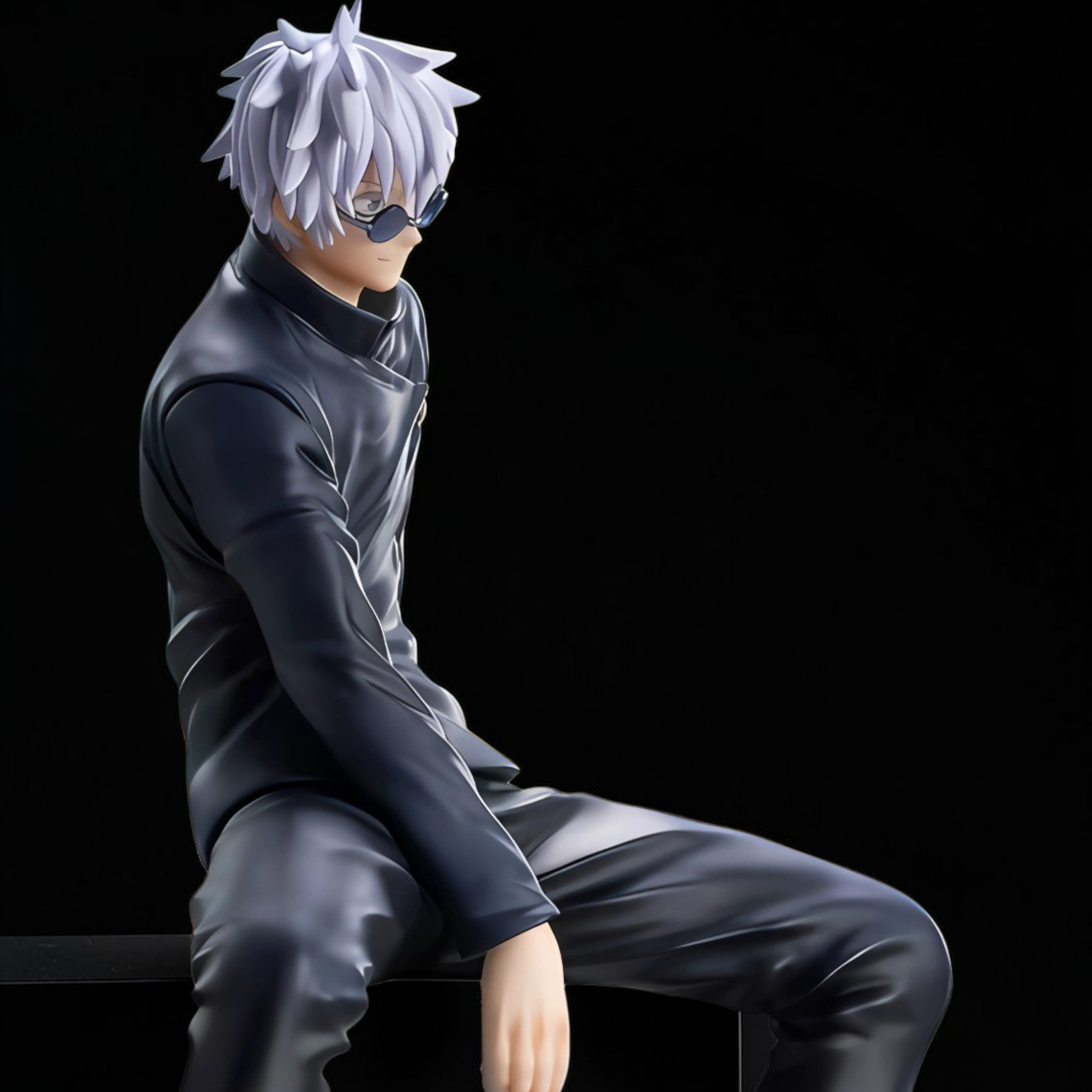 Anime character figurine with white hair and dark outfit sitting on a black background