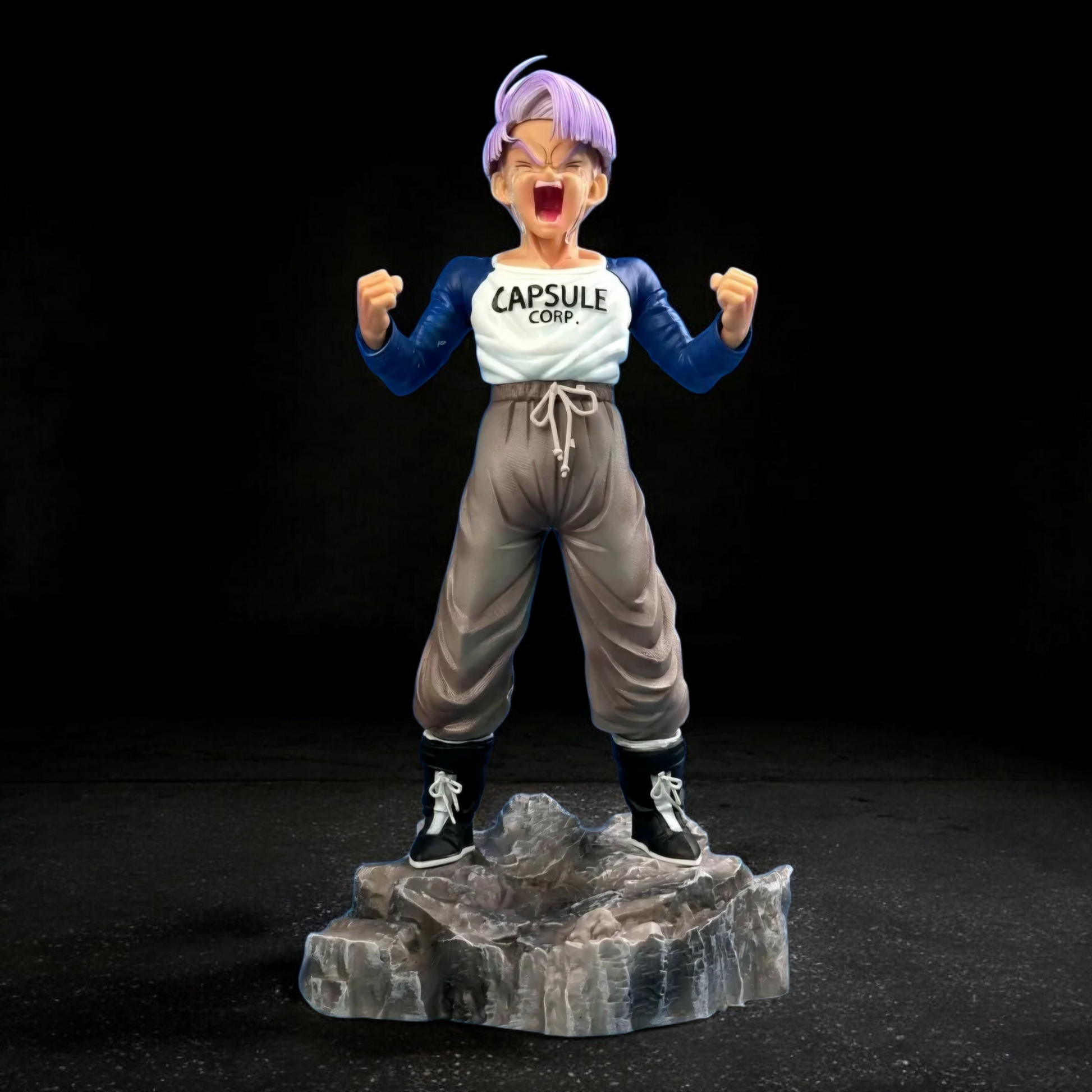Action figure of a character from a popular anime series on a black background