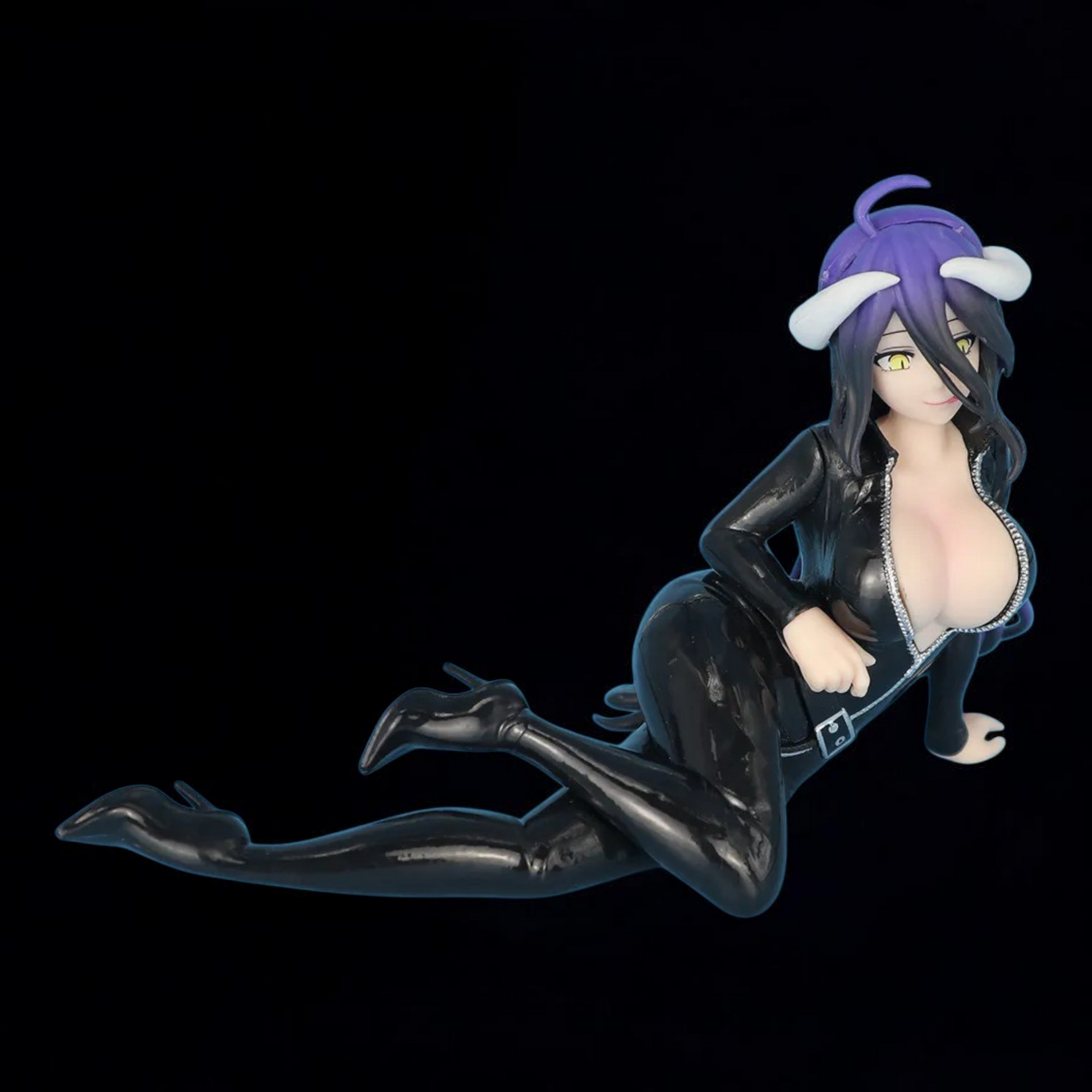 Figurine of a character in a black outfit with purple hair on a transparent background