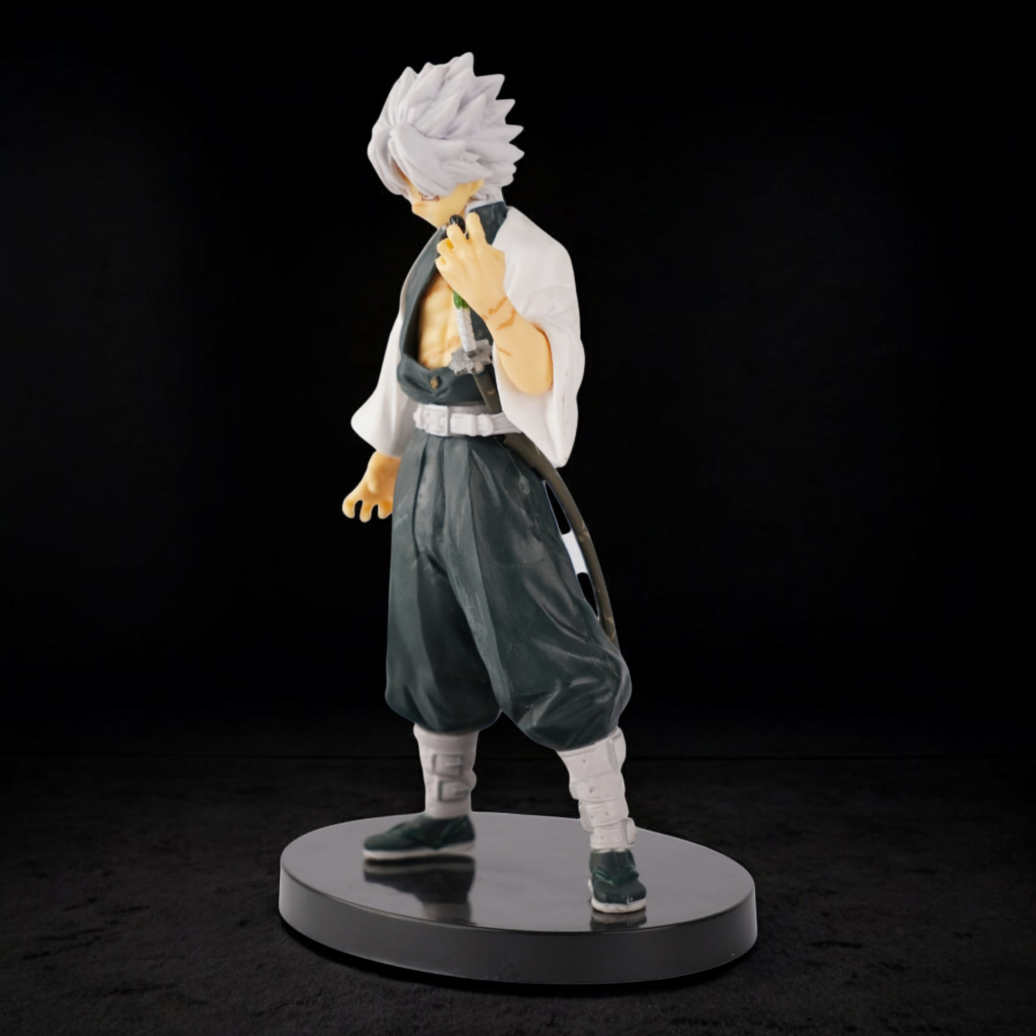 Figurine of an animated character on a black background