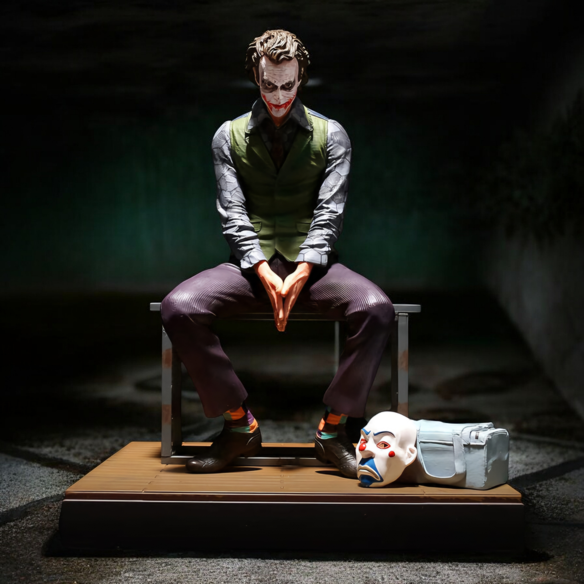 The Joker Interrogation Room Seated Pose Figure | DC Dark Knight Premium Collectible