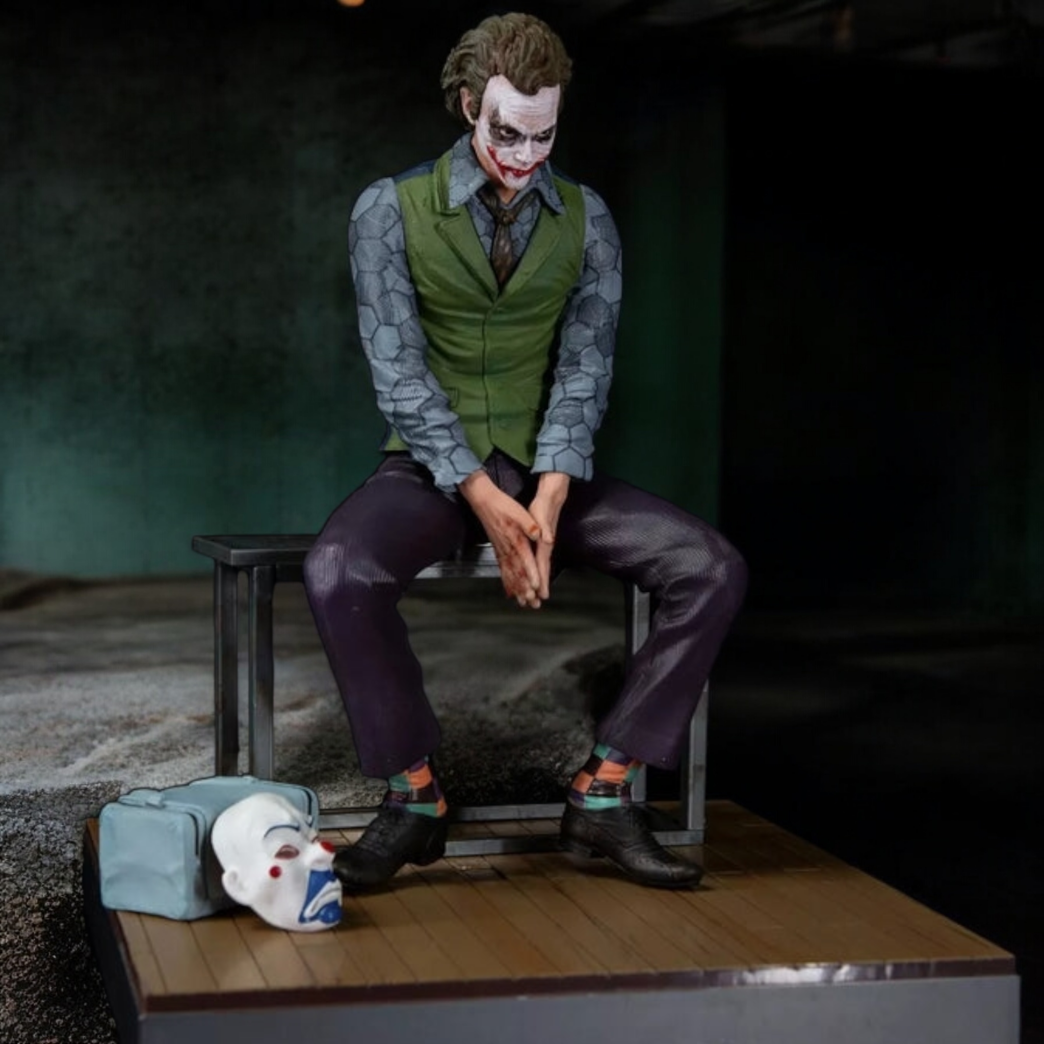 The Joker Interrogation Room Seated Pose Figure | DC Dark Knight Premium Collectible