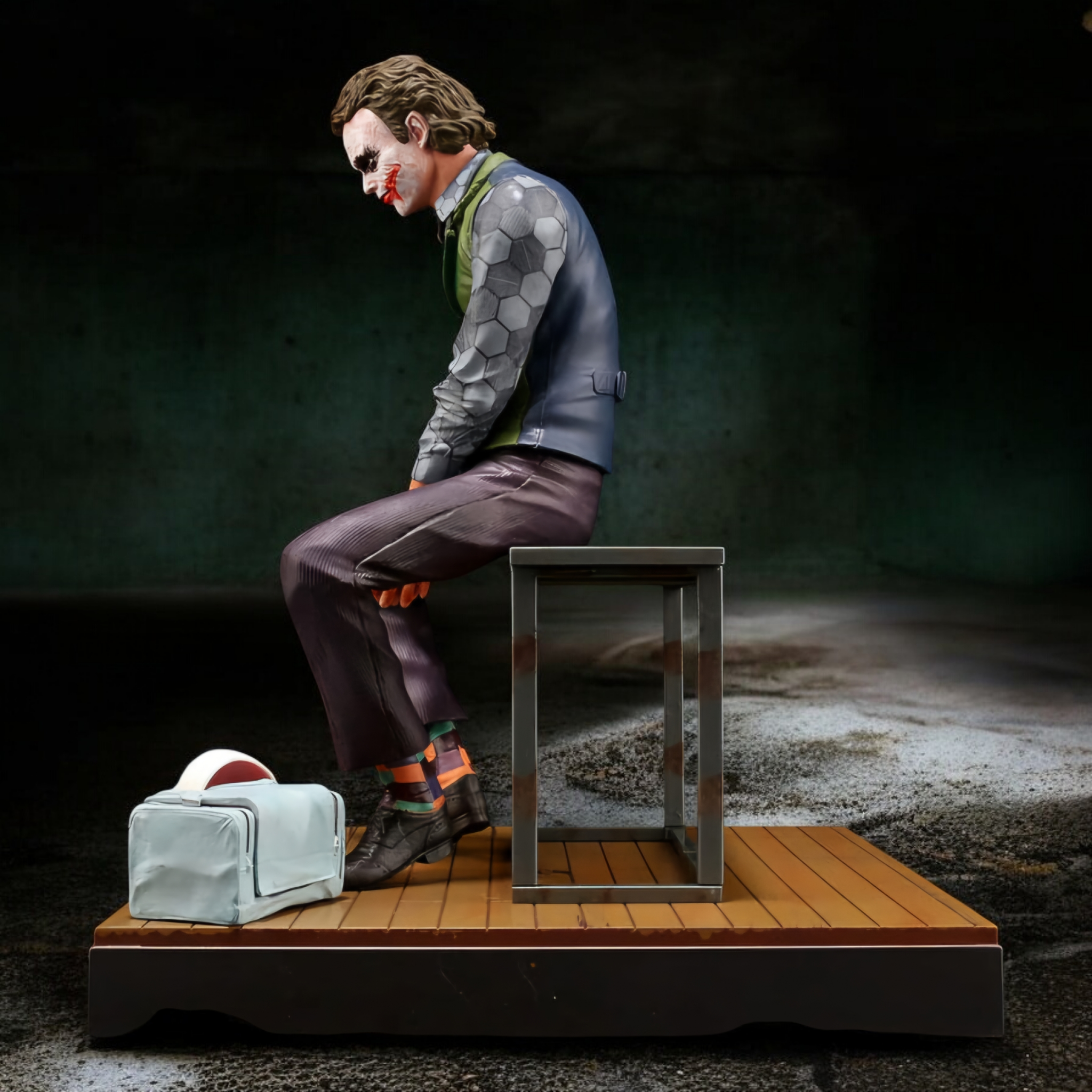 The Joker Interrogation Room Seated Pose Figure | DC Dark Knight Premium Collectible