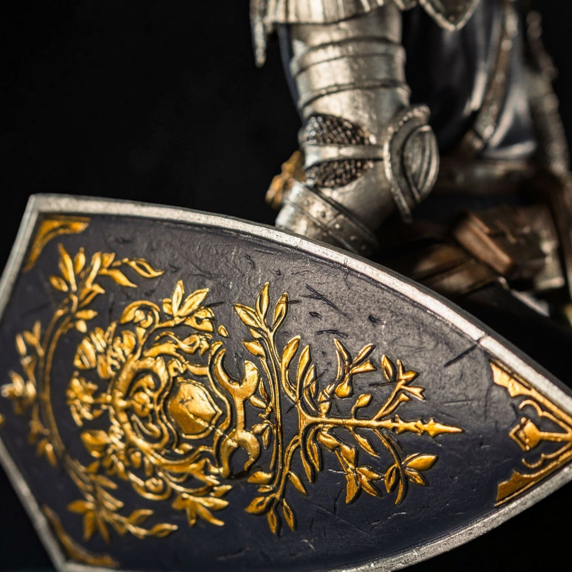 Decorative sword with gold emblem on a dark background