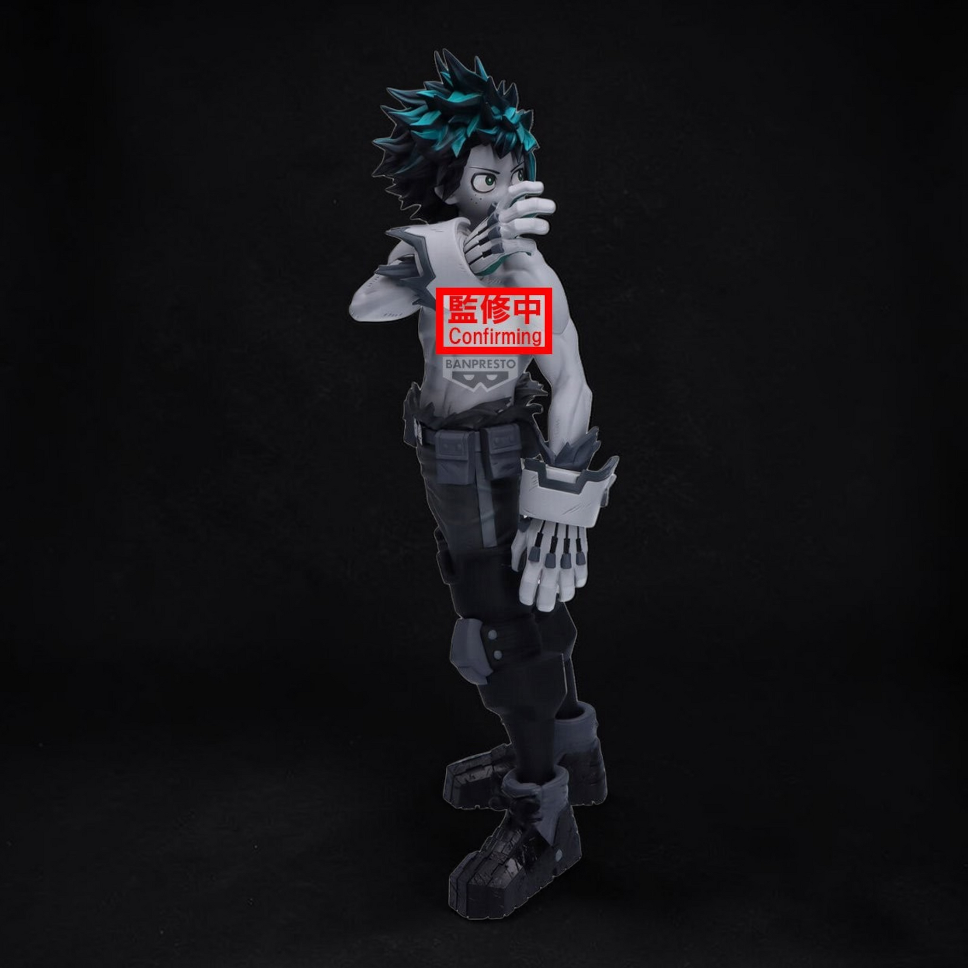Action figure with a red label on a black background