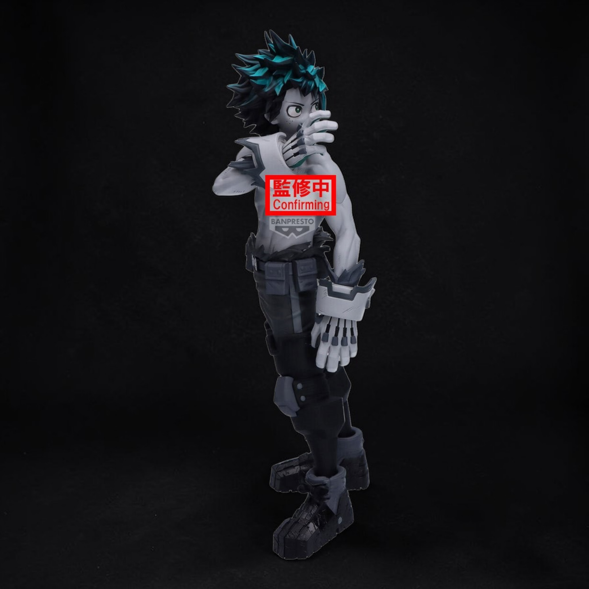 Action figure with a red label on a black background