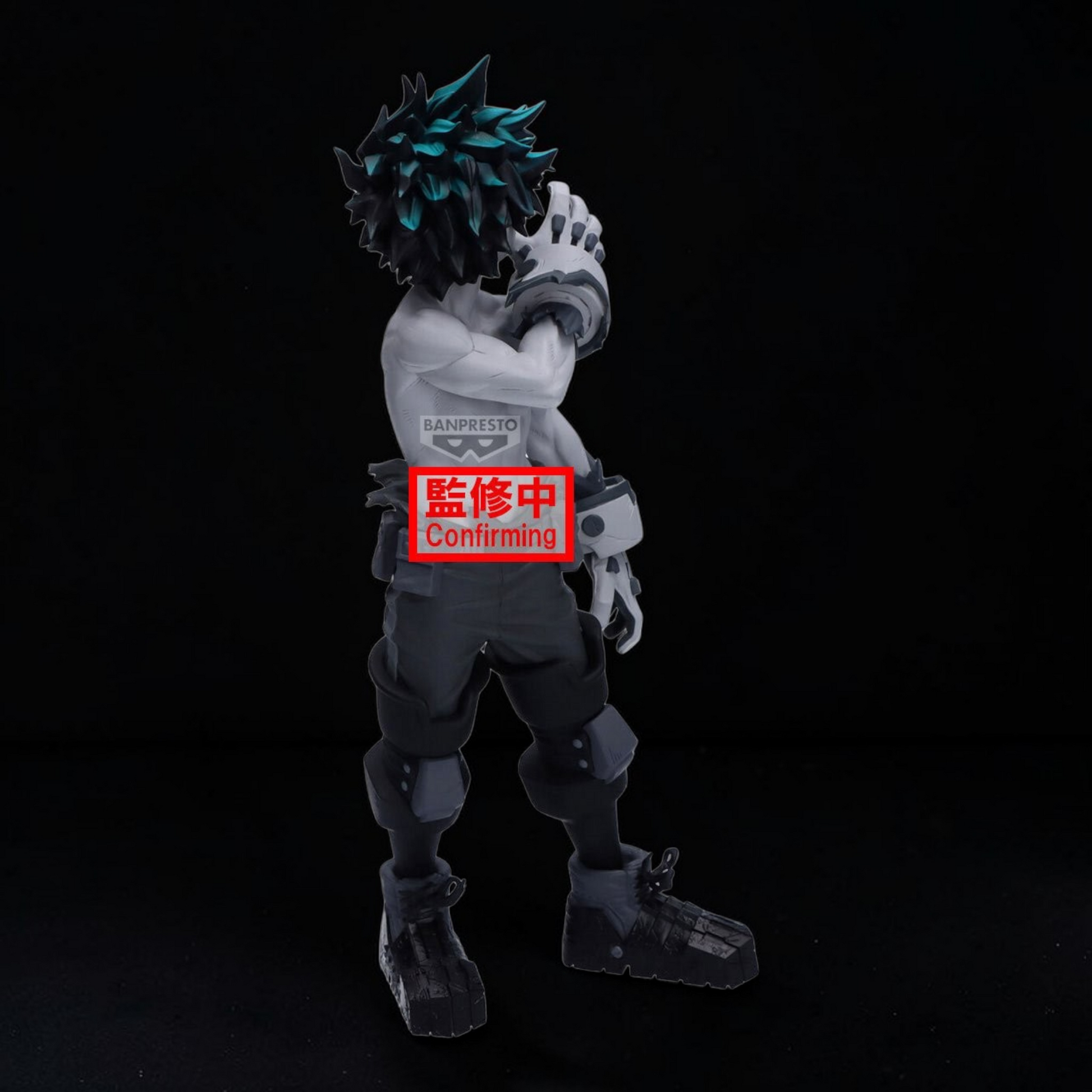 Action figure with a red label on a black background