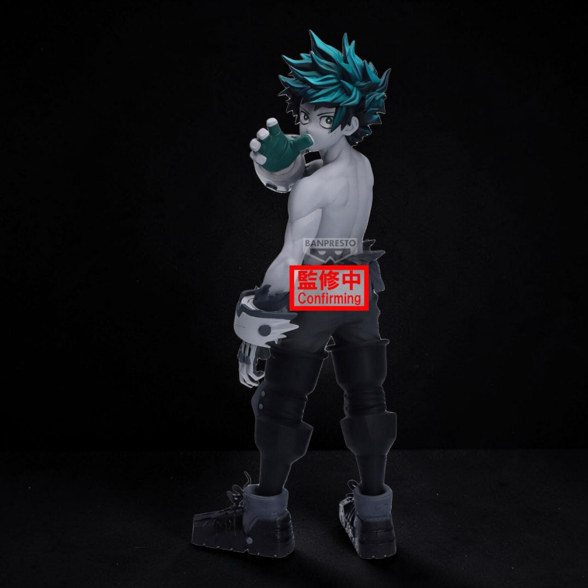 Action figure with blue hair and a helmet on a black background