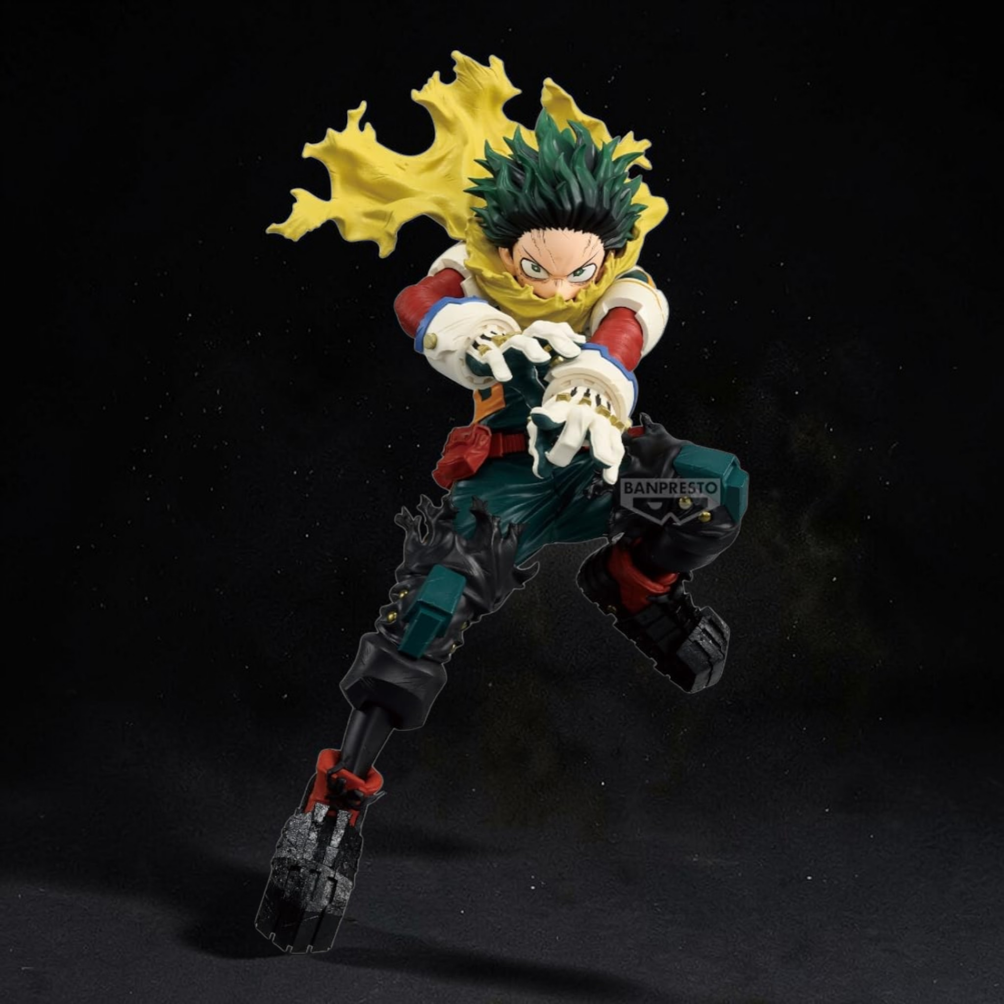 Action figure of a character with green hair and a yellow scarf on a black background