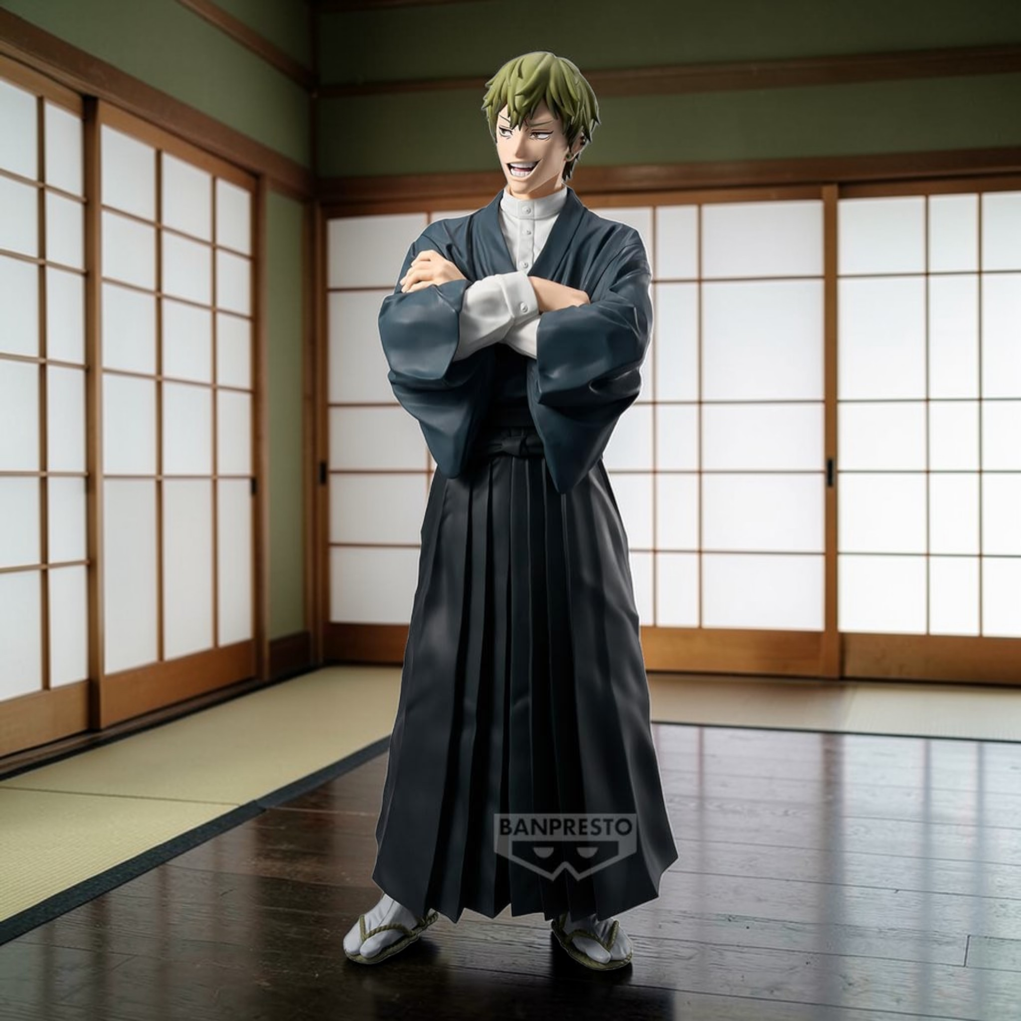 Person in a traditional Japanese kimono standing in a room with shoji screens.