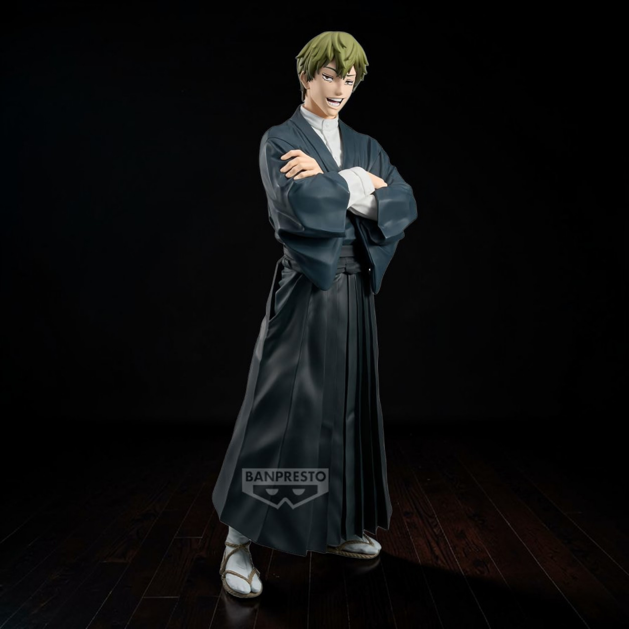 Figurine of a character in traditional attire with 'Banpresto' logo on a dark background