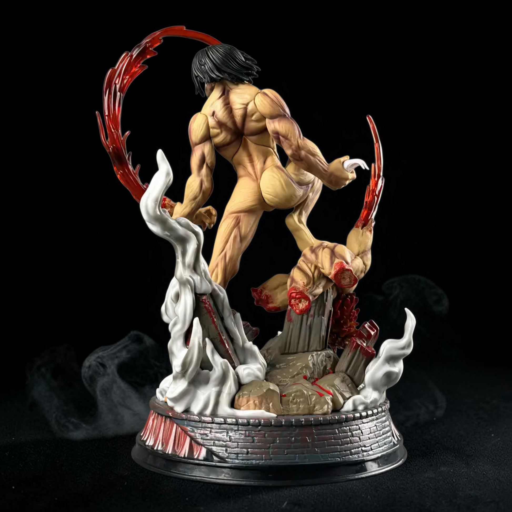 Statue of a muscular figure with weapons on a dark background