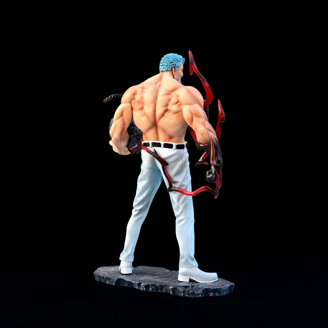Muscular character with blue hair and red ribbon standing in front of a ship with 'Marine' branding, surrounded by crates and cannonballs.