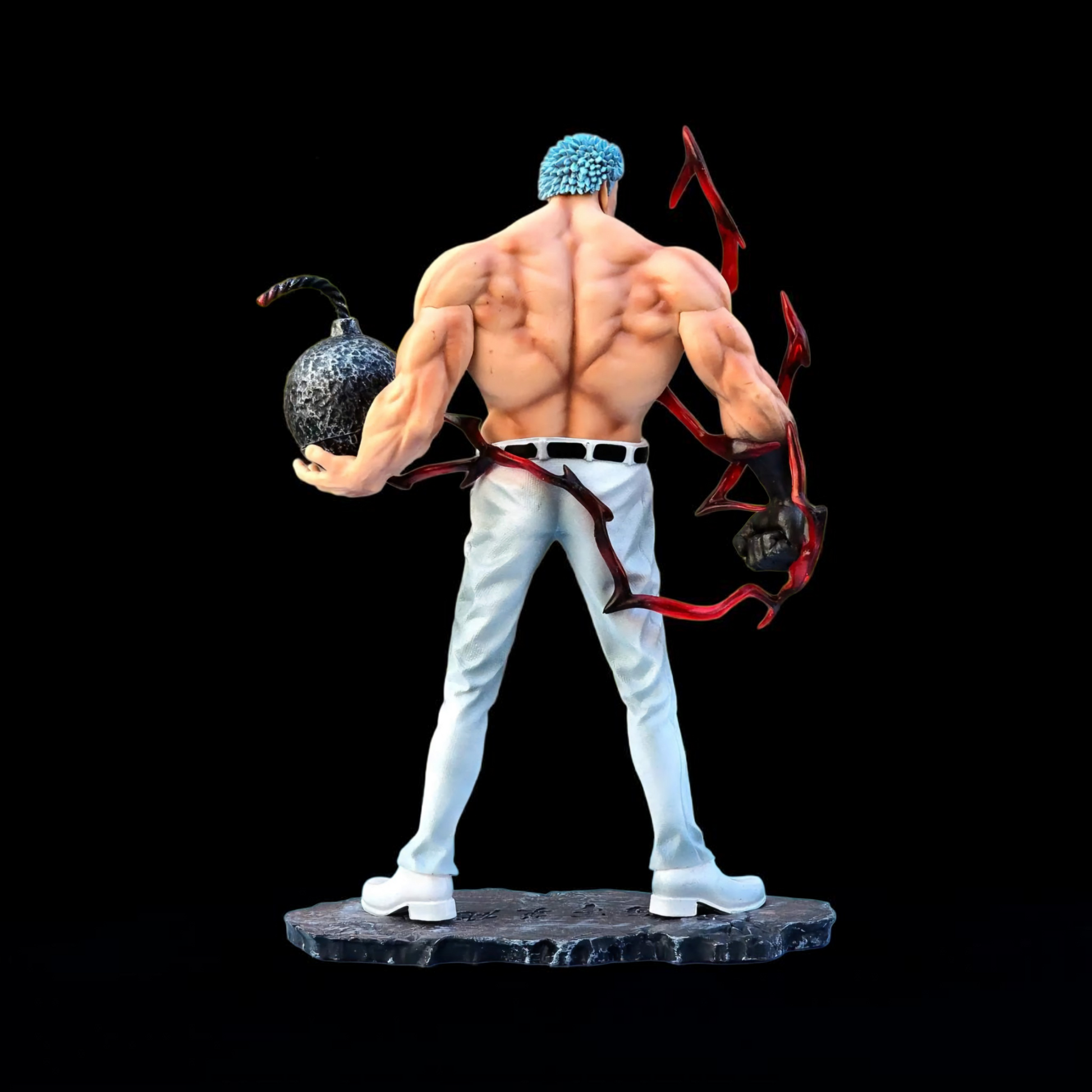 Muscular figure with a bomb and red ribbons on a black background