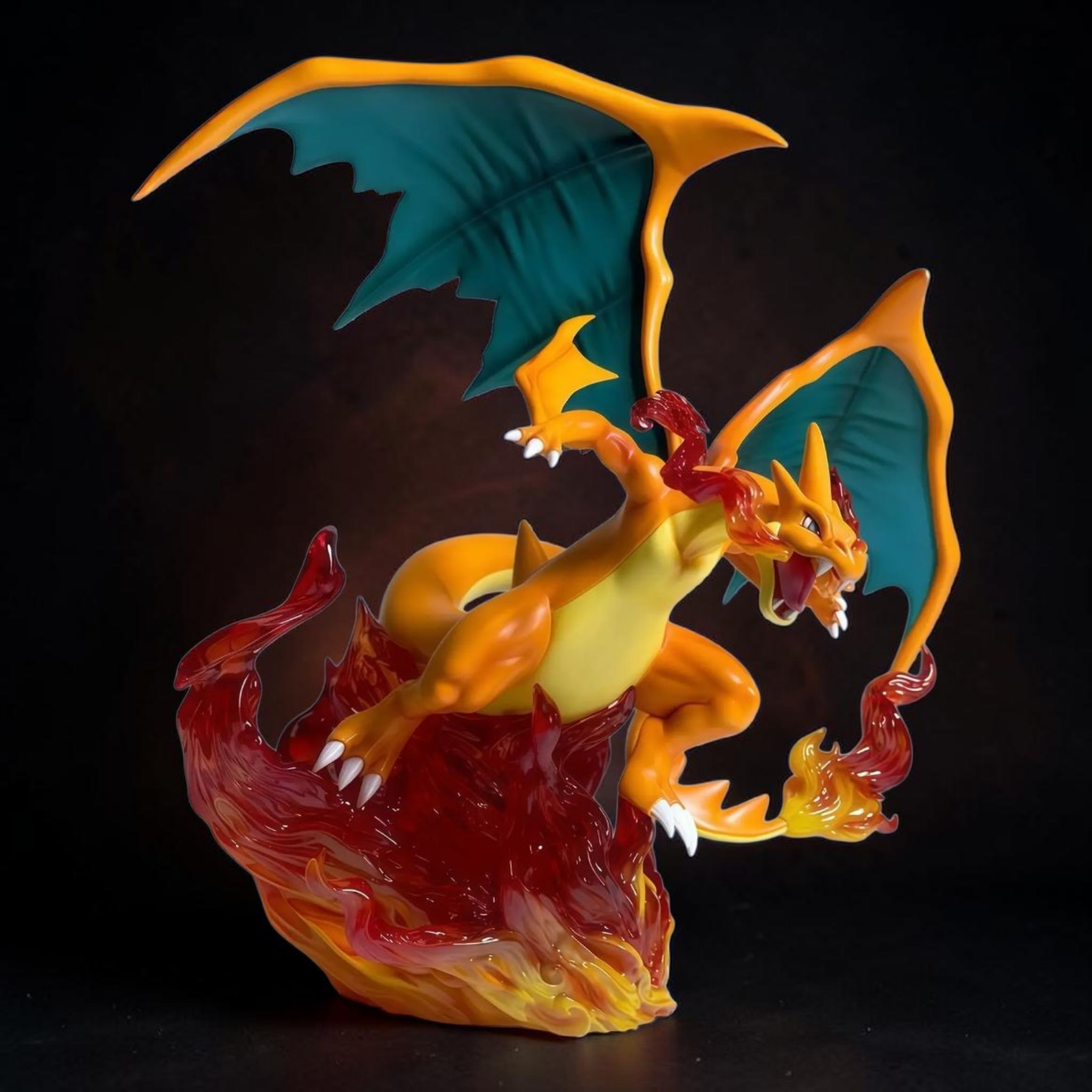Dragon-like creature with orange and yellow body, red underbelly, and teal wings on a black background