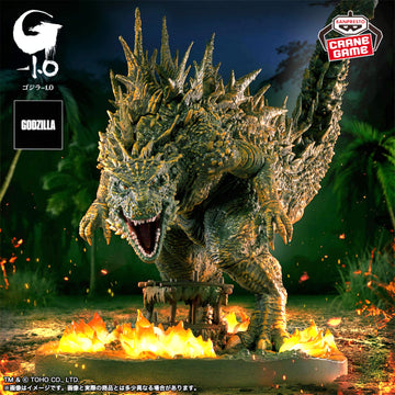Model of Godzilla with flames at its feet on a dark background