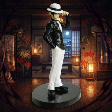 Statue of a person in formal attire in a decorative room with lanterns and traditional decor.