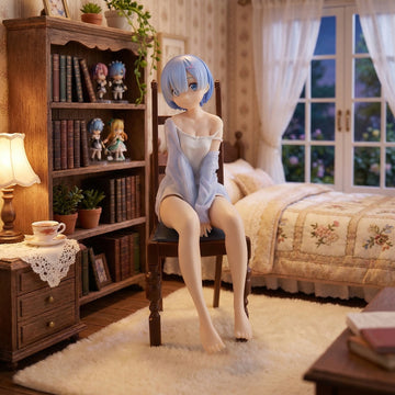 Anime character figurine sitting on a chair in a cozy room with a bookshelf and bed.