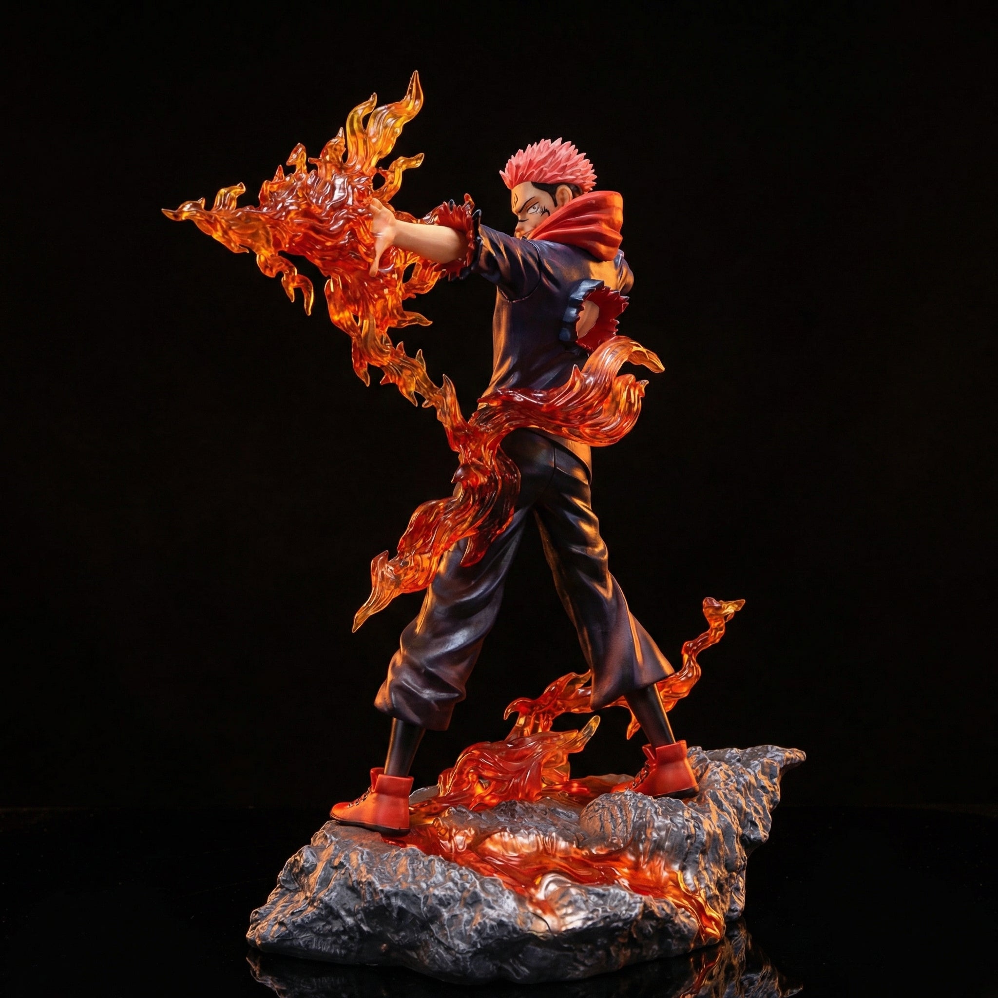 Statue of a character with flames and dynamic pose on a dark background