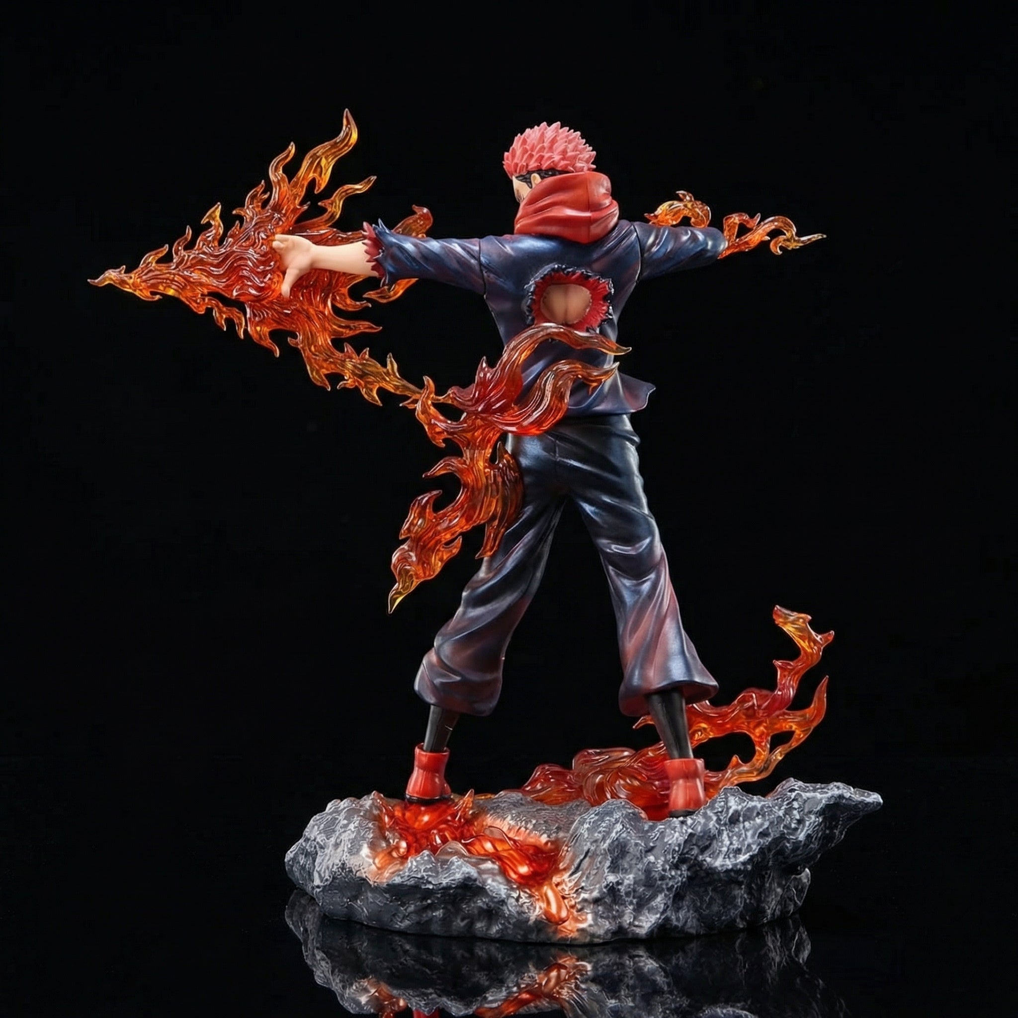 Statue of a character with fiery effects on a black background