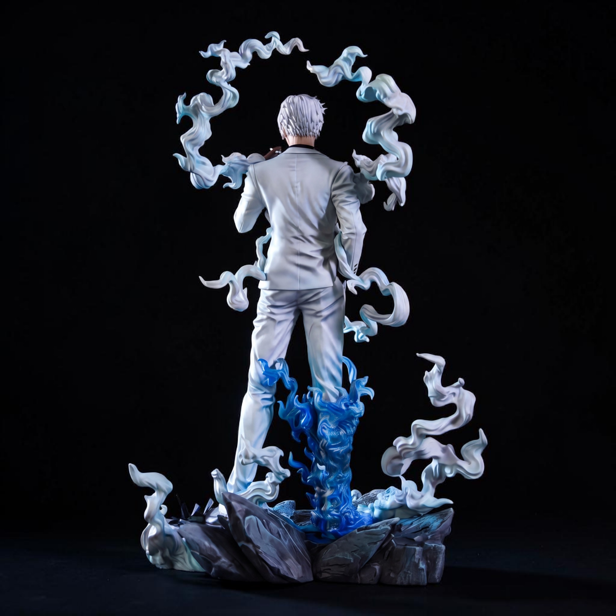 Statue of a person with white hair and clothing, surrounded by swirling blue and white energy on a dark background.