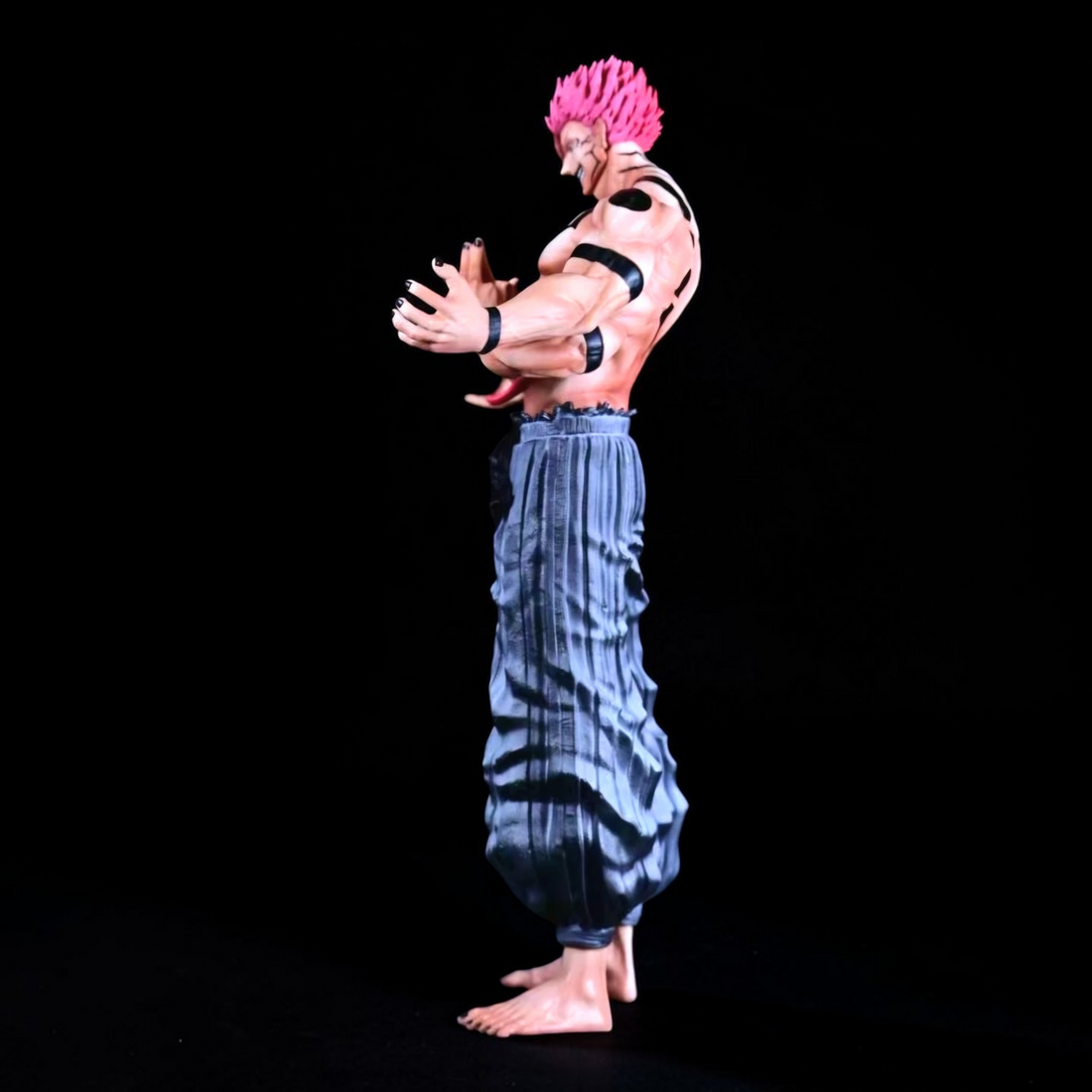 Animated character with pink hair and blue outfit standing in a fiery, apocalyptic setting with skeletons and torii gates.