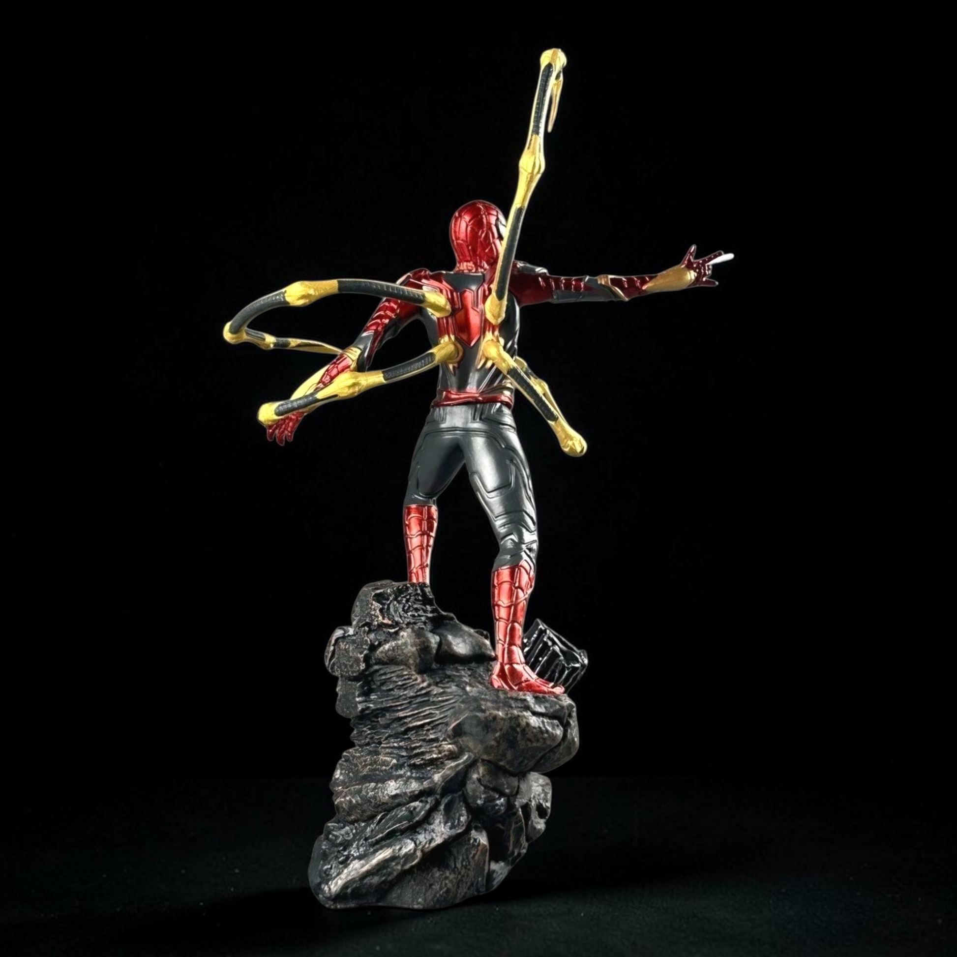 Superhero figurine with bow and arrows on a dark background