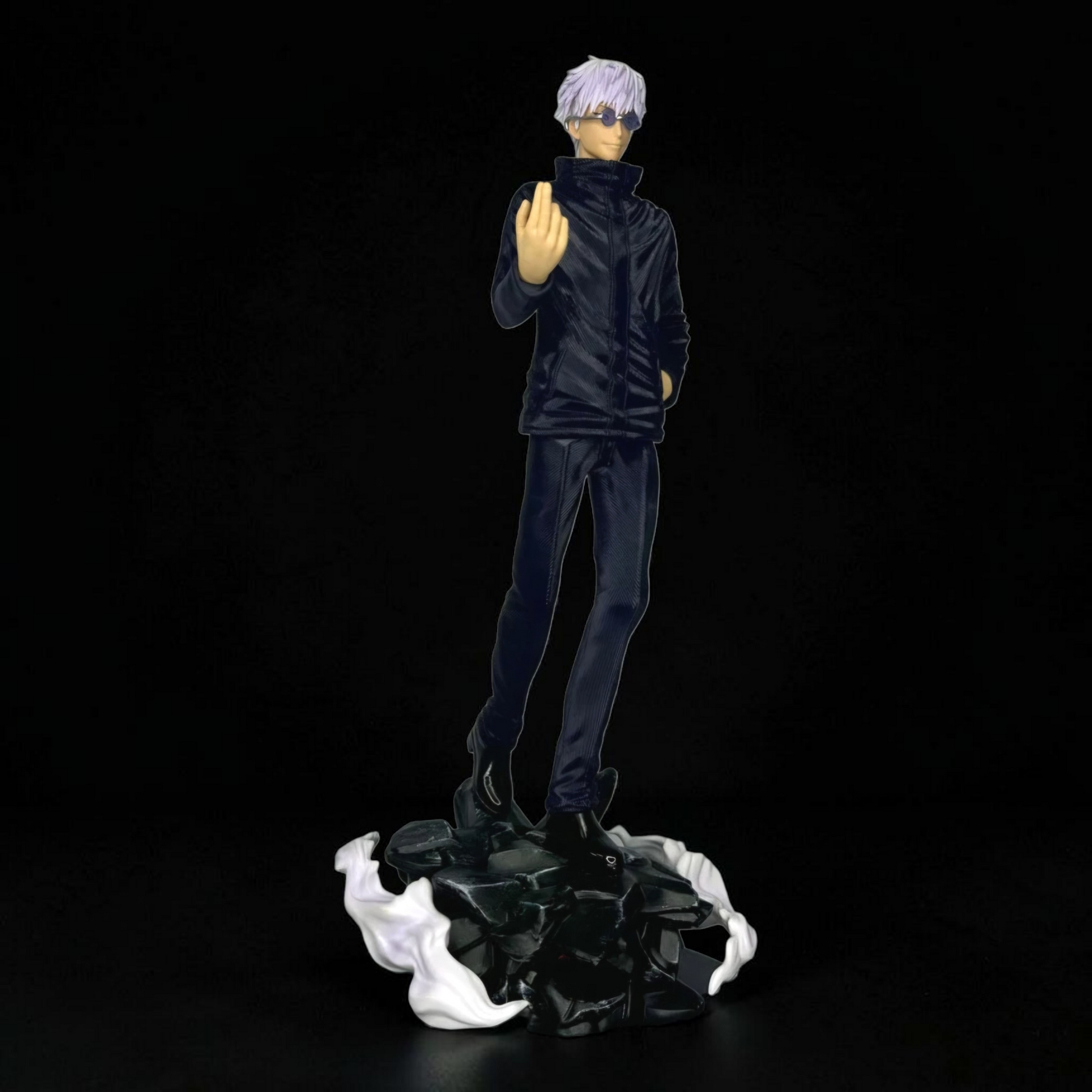Figurine of a character in a dark outfit on a black background