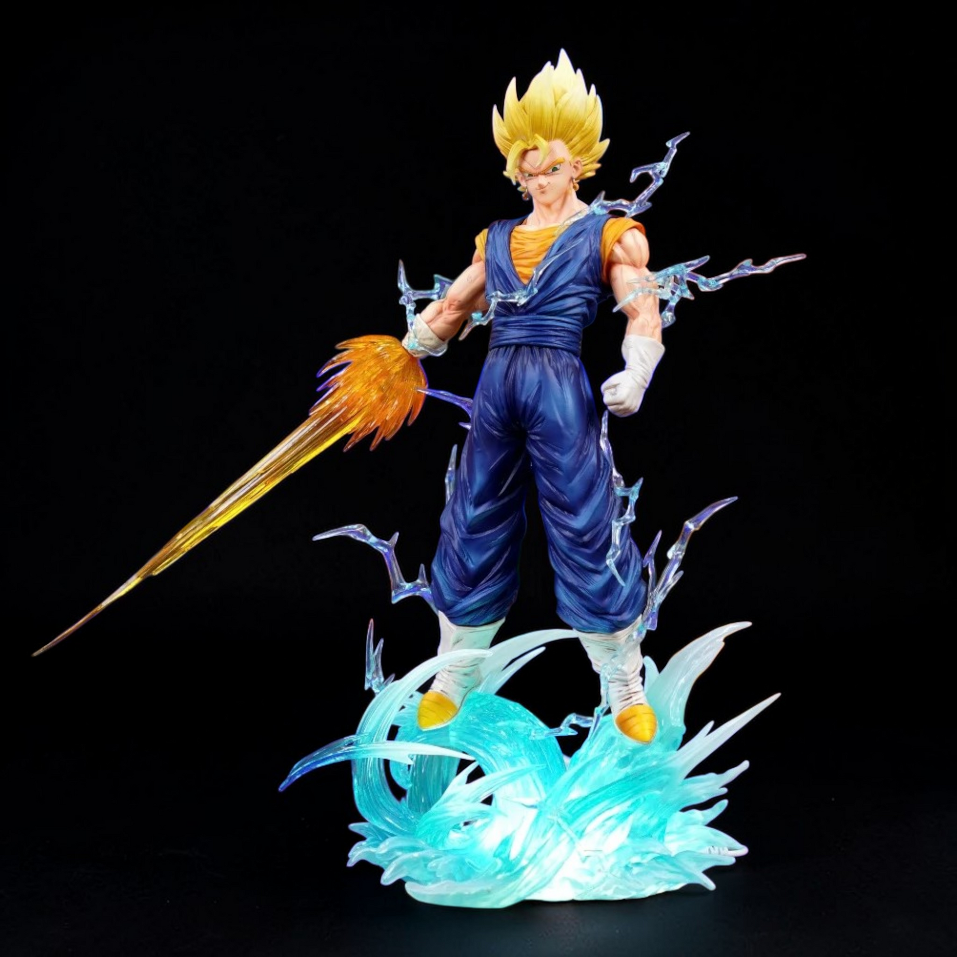 Super Saiyan character figure with energy effects on a black background